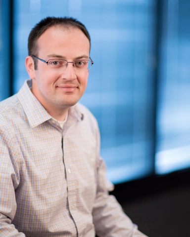 smiling person in professional attire